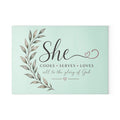 Decorative sign with text 'She cooks, serves, loves all to the glory of God' on a light green background | FaithfulFindsNZ
