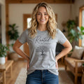 Rooted in Christ T‑Shirt — Faith Tree Design (Colossians 2:7)