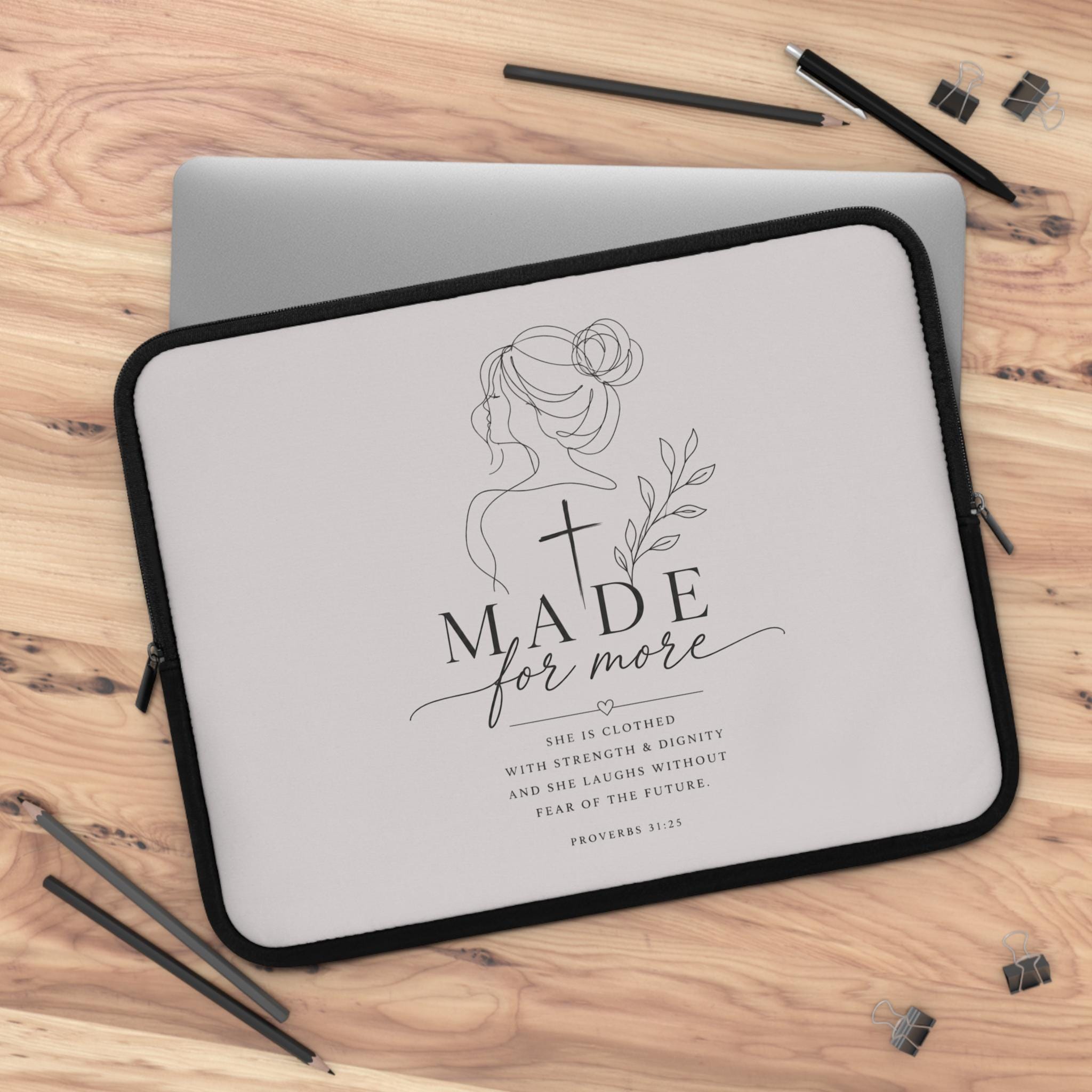 Black neoprene laptop sleeve with Proverbs 31:25 faith verse in elegant script on the front panel.